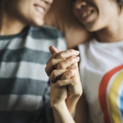 couple holding hands at the LGBTQ addiction treatment center